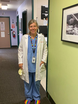 This is a picture of a female healthcare professional smiling at John C. Fremont Healthcare District.